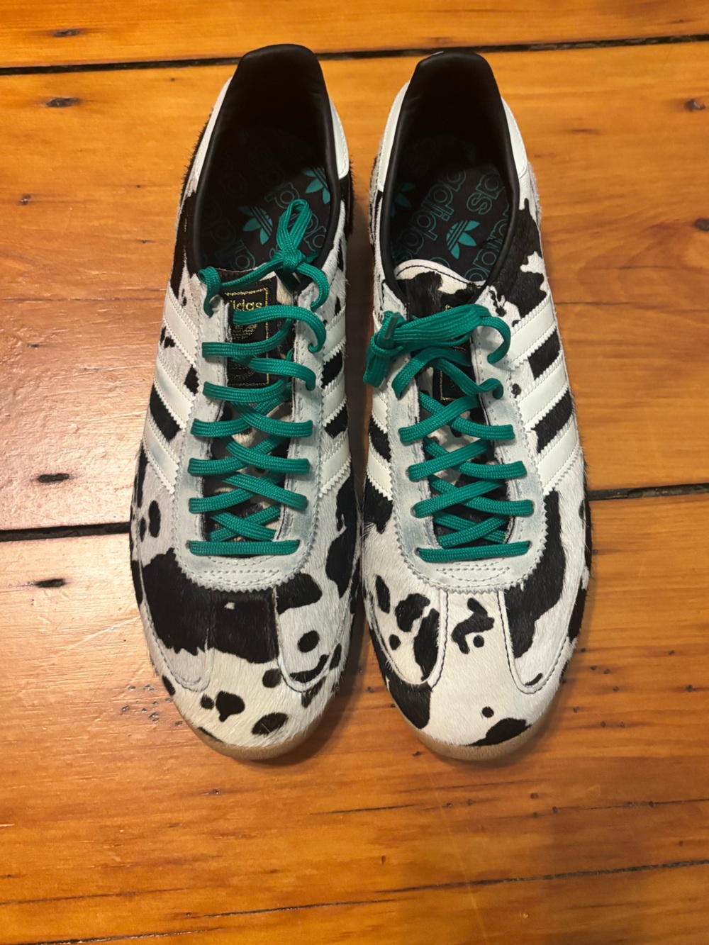 Adidas cow print sneakers